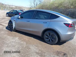 2024 Tesla Model Y Long Range with VIN 7SAYGDEE2RA311261, listed as a IAAI auction lot 41534010 with Not Provided miles and . Bid and sale history available at DreamBid. Image 3.