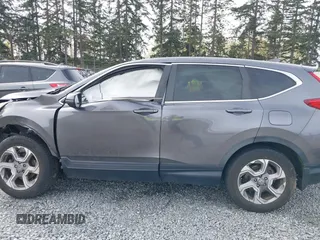 2019 Honda CR-V EX with VIN JHLRW2H57KX022530, listed as a IAAI auction lot 41970376 with 51,327 mi miles. Bid and sale history available at carsss.com. Image 15.