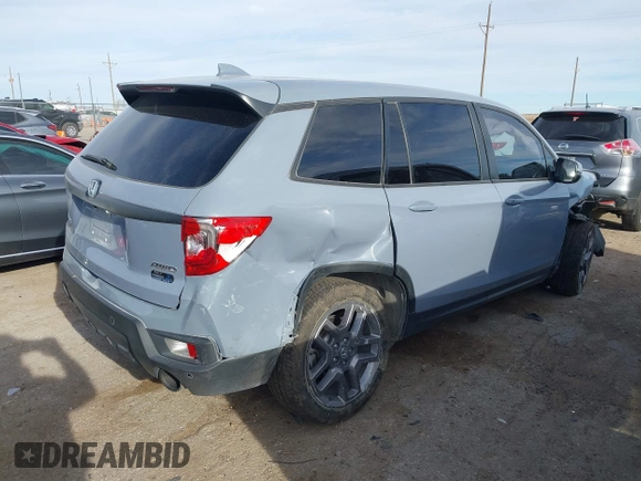 2023 Honda Passport EX-L with VIN 5FNYF8H52PB027082, listed as a IAAI auction lot 41788783 with 32,186 mi miles and . Bid and sale history available at carsss.com. Image 4.