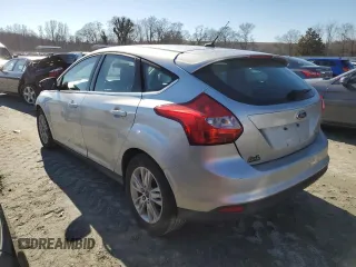 2012 Ford Focus SEL with VIN 1FAHP3M27CL316886, listed as a Copart auction lot 45092975 with 137,055 mi miles and Salvage Title. Bid and sale history available at carsss.com. Image 2.