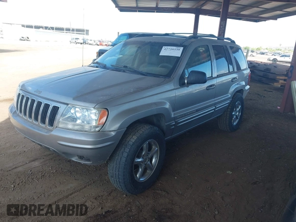 2002 Jeep Grand Cherokee Limited with VIN 1J8GW58J62C165942, listed as a IAAI auction lot 42739339 with 220,677 mi miles and . Bid and sale history available at DreamBid. Image 2.
