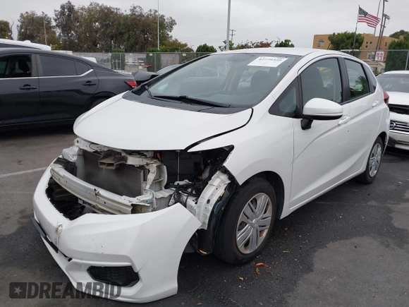 2020 Honda Fit LX with VIN 3HGGK5H41LM715918, listed as a IAAI auction lot 42779329 with 50,898 mi miles and . Bid and sale history available at DreamBid. Image 2.