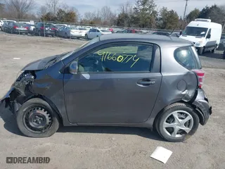 2012 Scion iQ with VIN JTNJJXB04CJ020060, listed as a IAAI auction lot 41660774 with 187,025 mi miles. Bid and sale history available at carsss.com. Image 14.