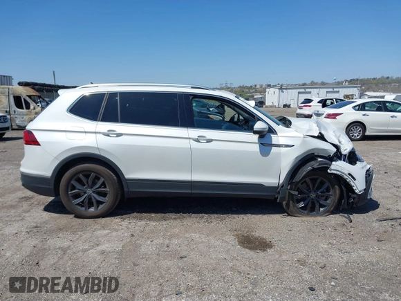 2023 Volkswagen Tiguan SE with VIN 3VVMB7AX4PM128427, listed as a IAAI auction lot 42054477 with 29,731 mi miles and . Bid and sale history available at DreamBid. Image 12.
