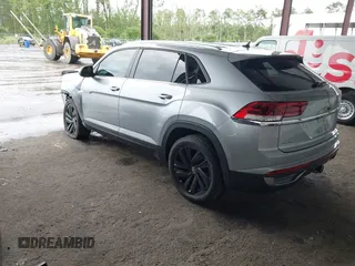 2023 Volkswagen Atlas SE z VIN 1V2HE2CA0PC222291, wystawiony jako IAAI lot #42431536 z przebiegiem 23 114 mil mil oraz . Historia ofert i sprzedaży dostępna na DreamBid. Obrazek 3.