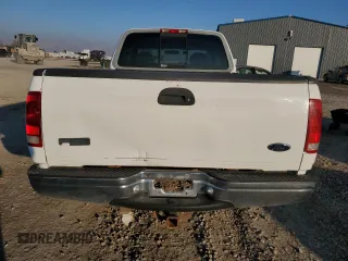 1998 Ford F-150 z VIN 1FTZX18W3WKB01774, wystawiony jako Copart lot #88670315 z przebiegiem 102 301 mil mil oraz Szkoda całkowita • Salvage title. Historia ofert i sprzedaży dostępna na DreamBid. Obrazek 6.