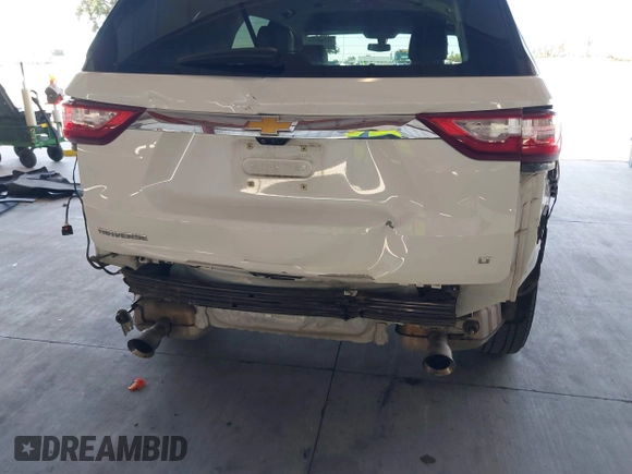 2021 Chevrolet Traverse LT with VIN 1GNERHKW8MJ232171, listed as a IAAI auction lot 42269142 with 88,830 mi miles and . Bid and sale history available at DreamBid. Image 6.