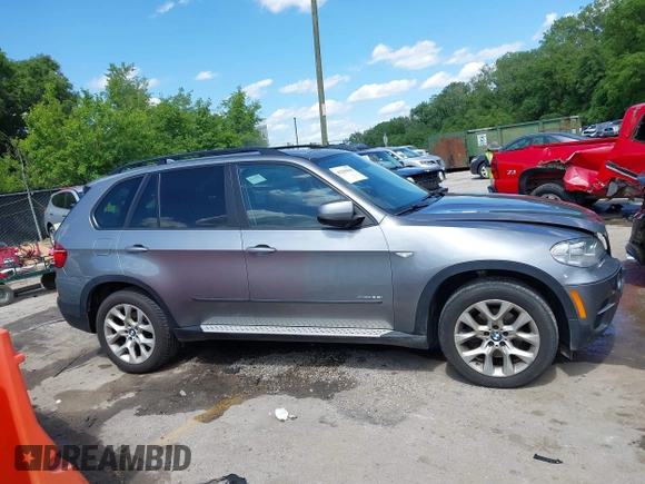 2012 BMW X5 35i z VIN 5UXZV4C50CL989684, wystawiony jako IAAI lot #42284840 z przebiegiem 134 056 mil mil oraz . Historia ofert i sprzedaży dostępna na DreamBid. Obrazek 13.