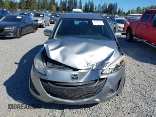 2014 Mazda 5 Sport z VIN JM1CW2BL0E0172678, wystawiony jako IAAI lot #42192057 z przebiegiem 89 848 mil mil oraz . Historia ofert i sprzedaży dostępna na DreamBid. Obrazek 12.