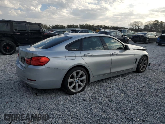 2015 BMW 4 Series 428i with VIN WBA4A5C59FG051139, listed as a Copart auction lot 45186185 with 141,839 mi miles and Clean Title. Bid and sale history available at DreamBid. Image 3.
