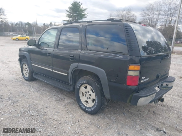 2004 Chevrolet Tahoe LT with VIN 1GNEC13Z74J314927, listed as a IAAI auction lot 41231288 with 195,809 mi miles. Bid and sale history available at carsss.com. Image 3.
