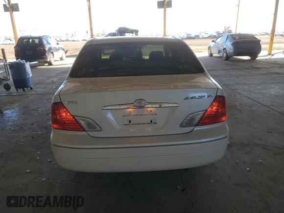 2001 Toyota Avalon XL with VIN 4T1BF28B71U123194, listed as a Copart auction lot 84050604 with 199,807 mi miles and Salvage Title. Bid and sale history available at DreamBid. Image 6.