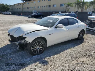 2018 Maserati Ghibli z VIN ZAM57XSAXJ1285281, wystawiony jako Copart lot #85686514 z przebiegiem 79 931 mil mil oraz Szkoda całkowita • Salvage title. Historia ofert i sprzedaży dostępna na DreamBid. Obrazek 1.