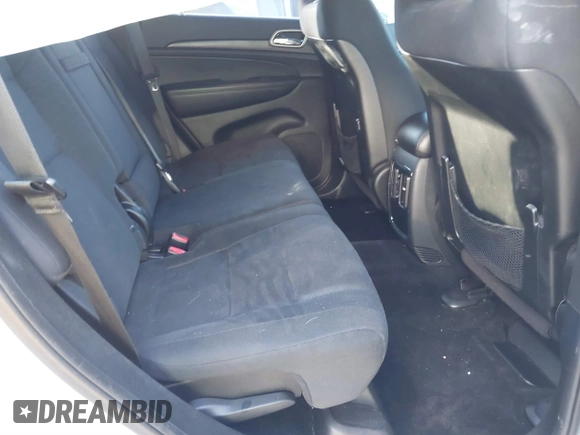 2017 Jeep Grand Cherokee Laredo with VIN 1C4RJFAGXHC756562, listed as a IAAI auction lot 40793476 with 102,241 mi miles and . Bid and sale history available at DreamBid. Image 8.