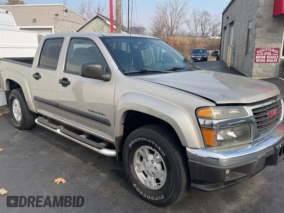 2004 GMC Canyon 1SB SLE Z85 with VIN 1GTDT136648111531, listed as a Copart auction lot 80749344 with 130,484 mi miles and Clean Title. Bid and sale history available at carsss.com. Image 1.