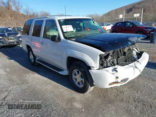 2000 Cadillac Escalade z VIN 1GYEK63R7YR219133, wystawiony jako IAAI lot #41585673 z przebiegiem 184 738 mil mil oraz . Historia ofert i sprzedaży dostępna na DreamBid. Obrazek 1.