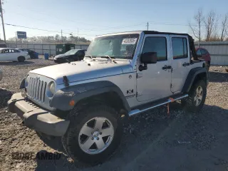 2009 Jeep Wrangler Unlimited X with VIN 1J4GA39139L757764, listed as a Copart auction lot 43352835 with 0 mi miles and Salvage Title. Bid and sale history available at carsss.com. Image 1.