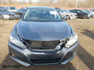 2018 Nissan Altima 2.5 SV with VIN 1N4AL3AP9JC166273, listed as a IAAI auction lot 41694295 with 83,864 mi miles. Bid and sale history available at carsss.com. Image 12.