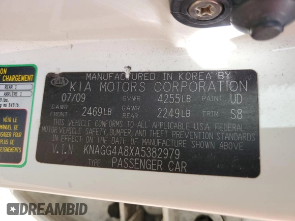 2010 Kia Optima LX z VIN KNAGG4A8XA5382979, wystawiony jako Copart lot #57067065 z przebiegiem 104 611 mil mil oraz Szkoda całkowita • Salvage title. Historia ofert i sprzedaży dostępna na DreamBid. Obrazek 12.