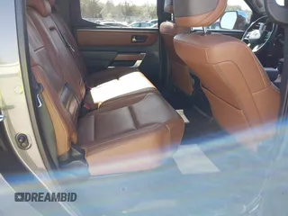 2022 Toyota Tundra 1794 Edition with VIN 5TFMA5DB9NX015571, listed as a IAAI auction lot 41730283 with 76,429 mi miles and . Bid and sale history available at DreamBid. Image 8.