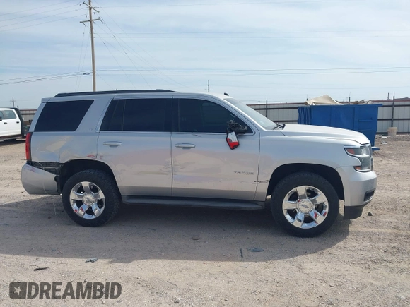 2015 Chevrolet Tahoe LT with VIN 1GNSCBKC9FR111984, listed as a IAAI auction lot 42003685 with 186,391 mi miles and . Bid and sale history available at DreamBid. Image 13.