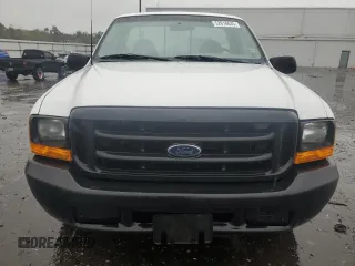 1999 Ford Super Duty F-250 XL with VIN 1FTNF20L0XEA51389, listed as a Copart auction lot 52618635 with 198,767 mi miles and Salvage Title. Bid and sale history available at carsss.com. Image 5.