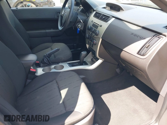 2011 Ford Focus SE with VIN 1FAHP3FN2BW100531, listed as a IAAI auction lot 42006640 with 63,563 mi miles and . Bid and sale history available at DreamBid. Image 5.