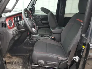 2021 Jeep Wrangler Rubicon z VIN 1C4HJXCG2MW665809, wystawiony jako Copart lot #84007354 z przebiegiem Nie podano mil oraz Szkoda całkowita • Salvage title. Historia ofert i sprzedaży dostępna na DreamBid. Obrazek 7.