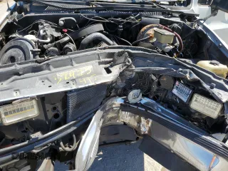 1990 GMC Jimmy z VIN 1GKEV18K4LF509467, wystawiony jako Copart lot #52405495 z przebiegiem 409 007 mil mil oraz Nie do naprawy • Non repairable. Historia ofert i sprzedaży dostępna na DreamBid. Obrazek 12.