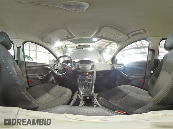 2018 Ford Focus SE z VIN 1FADP3FE4JL289830, wystawiony jako Copart lot #53350265 z przebiegiem 72 963 mil mil oraz Szkoda całkowita • Salvage title. Historia ofert i sprzedaży dostępna na DreamBid. Obrazek 14.