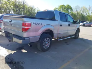 2011 Ford F-150 XLT with VIN 1FTFW1ETXBFB77415, listed as a IAAI auction lot 42048378 with 202,620 mi miles. Bid and sale history available at carsss.com. Image 4.