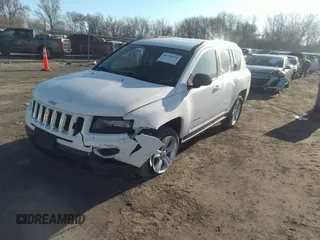 2014 Jeep Compass Sport with VIN 1C4NJCBB7ED508470, listed as a IAAI auction lot 41760536 with 133,628 mi miles and . Bid and sale history available at DreamBid. Image 2.