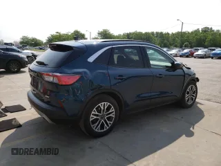 2020 Ford Escape SEL with VIN 1FMCU0H63LUA08628, listed as a Copart auction lot 60546095 with 33,439 mi miles and Salvage title. Bid and sale history available at DreamBid. Image 3.