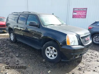 2014 GMC Yukon XL SLT with VIN 1GKS2KE77ER199723, listed as a IAAI auction lot 41555112 with 215,436 mi miles. Bid and sale history available at carsss.com. Image 1.