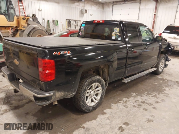 2016 Chevrolet Silverado 1500 LT with VIN 1GCVKREC5GZ176474, listed as a IAAI auction lot 41983780 with 118,587 mi miles and . Bid and sale history available at DreamBid. Image 4.