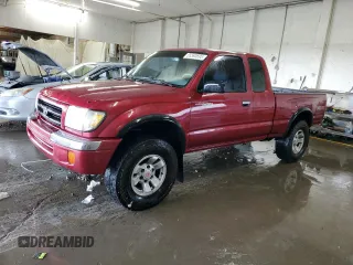 1998 Toyota Tacoma with VIN 4TAWN72NXWZ132180, listed as a Copart auction lot 65593695 with 266,993 mi miles and Salvage title. Bid and sale history available at DreamBid. Image 1.