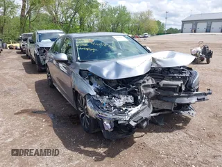 2022 Honda Civic EX with VIN 2HGFE1F71NH314816, listed as a IAAI auction lot 42178701 with 37,885 mi miles and . Bid and sale history available at DreamBid. Image 1.