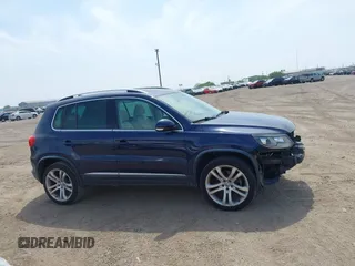 2012 Volkswagen Tiguan SEL with VIN WVGAV7AX8CW536752, listed as a IAAI auction lot 41798619 with 128,223 mi miles and . Bid and sale history available at DreamBid. Image 13.