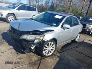 2010 Kia Forte SX with VIN KNAFW4A35A5299432, listed as a IAAI auction lot 41816492 with 54,871 mi miles. Bid and sale history available at carsss.com. Image 18.