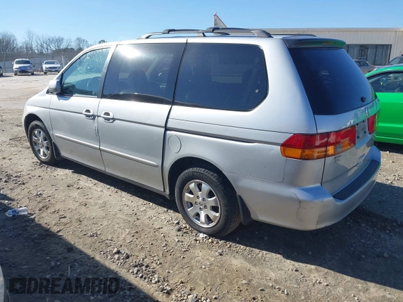 2004 Honda Odyssey EX-L with VIN 5FNRL18974B057715, listed as a IAAI auction lot 41762518 with 193,626 mi miles and . Bid and sale history available at DreamBid. Image 3.