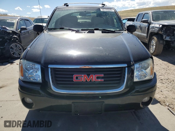 2005 GMC Envoy SLE z VIN 1GKDT13S752390266, wystawiony jako Copart lot #50766935 z przebiegiem 115 225 mil mil oraz Szkoda całkowita • Salvage title. Historia ofert i sprzedaży dostępna na DreamBid. Obrazek 5.