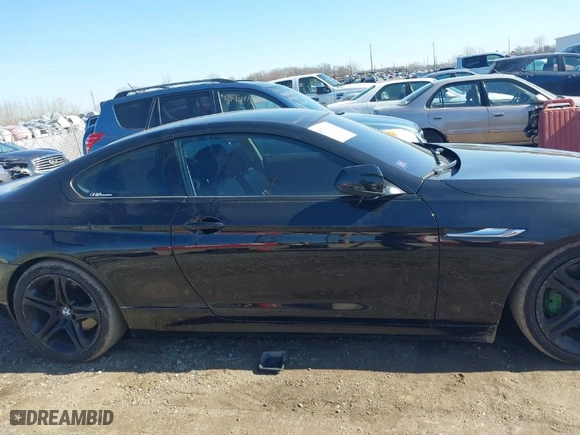 2012 BMW 6 Series 650i xDrive with VIN WBALX5C59CC894030, listed as a IAAI auction lot 41763126 with 115,562 mi miles. Bid and sale history available at carsss.com. Image 13.