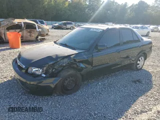1999 Mazda Protege DX with VIN JM1BJ2222X0126273, listed as a Copart auction lot 75479364 with 293,952 mi miles and Salvage Title. Bid and sale history available at DreamBid. Image 1.
