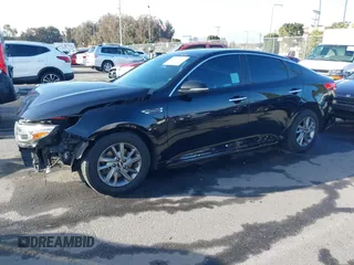 2019 Kia Optima LX with VIN 5XXGT4L32KG324877, listed as a IAAI auction lot 41713482 with 160,178 mi miles. Bid and sale history available at carsss.com. Image 14.
