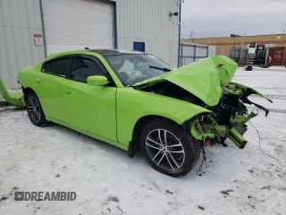 2019 Dodge Charger SXT with VIN 2C3CDXJG1KH706449, listed as a Copart auction lot 85907394 with 147,526 mi miles and Salvage Title. Bid and sale history available at DreamBid. Image 4.