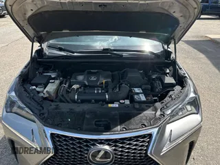 2017 Lexus NX 200t z VIN JTJBARBZ8H2111463, wystawiony jako Copart lot #58987995 z przebiegiem 254 433 mil mil oraz Tytuł czysty. Historia ofert i sprzedaży dostępna na DreamBid. Obrazek 7.