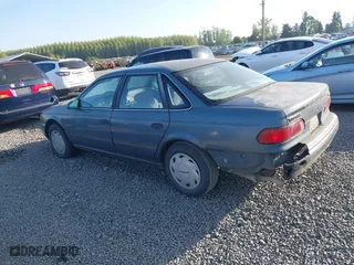 1993 Ford Taurus GL with VIN 1FALP5240PG327124, listed as a IAAI auction lot 42074204 with 27,681 mi miles. Bid and sale history available at carsss.com. Image 3.