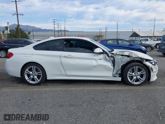 2019 BMW 4 Series 430i with VIN WBA4W3C5XKAF93081, listed as a IAAI auction lot 41689477 with 87,936 mi miles and . Bid and sale history available at DreamBid. Image 14.