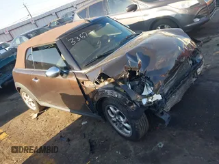 2011 MINI Convertible with VIN WMWZN3C55BT133367, listed as a IAAI auction lot 41781374 with 124,036 mi miles and . Bid and sale history available at DreamBid. Image 13.