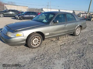 2001 Ford Crown Victoria with VIN 2FAFP73W71X112219, listed as a IAAI auction lot 41879317 with 159,344 mi miles. Bid and sale history available at carsss.com. Image 2.